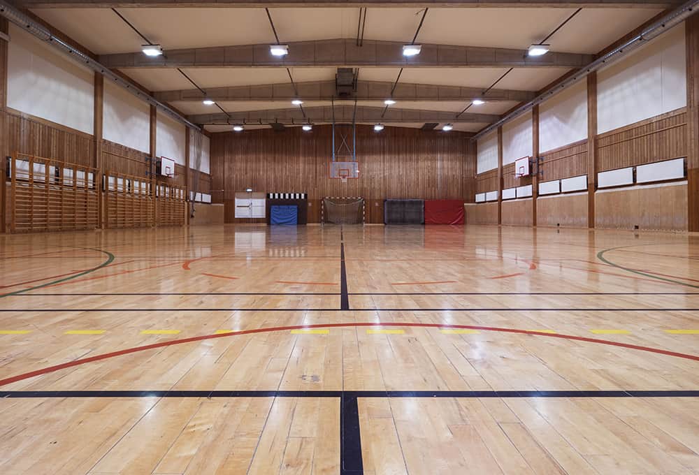 Wood Floor Care | Interior of an old gymhall