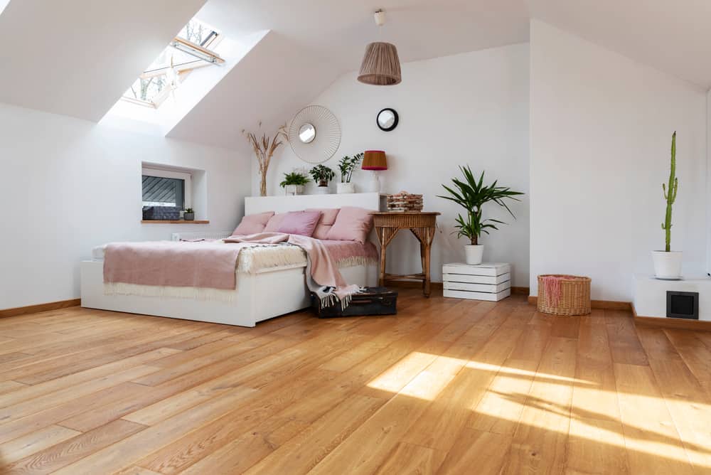 Finishes for Wooden Floors | Quaint bedroom with wooden flooring