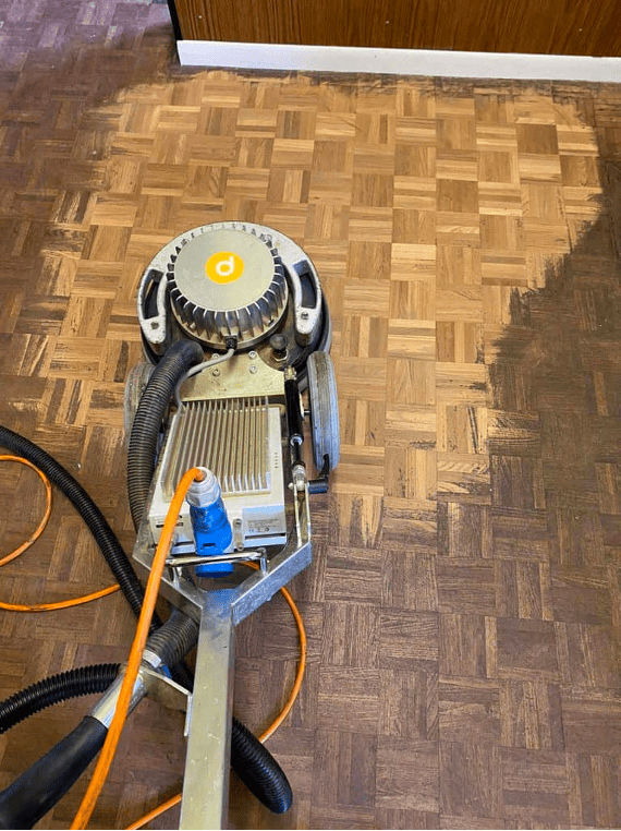 floor sanding | Our floor sander working on a wood floor