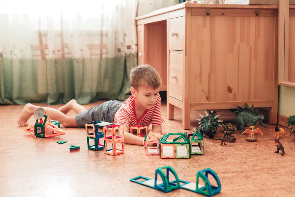 Cork Tiles For Flooring | child playing on cork flooring
