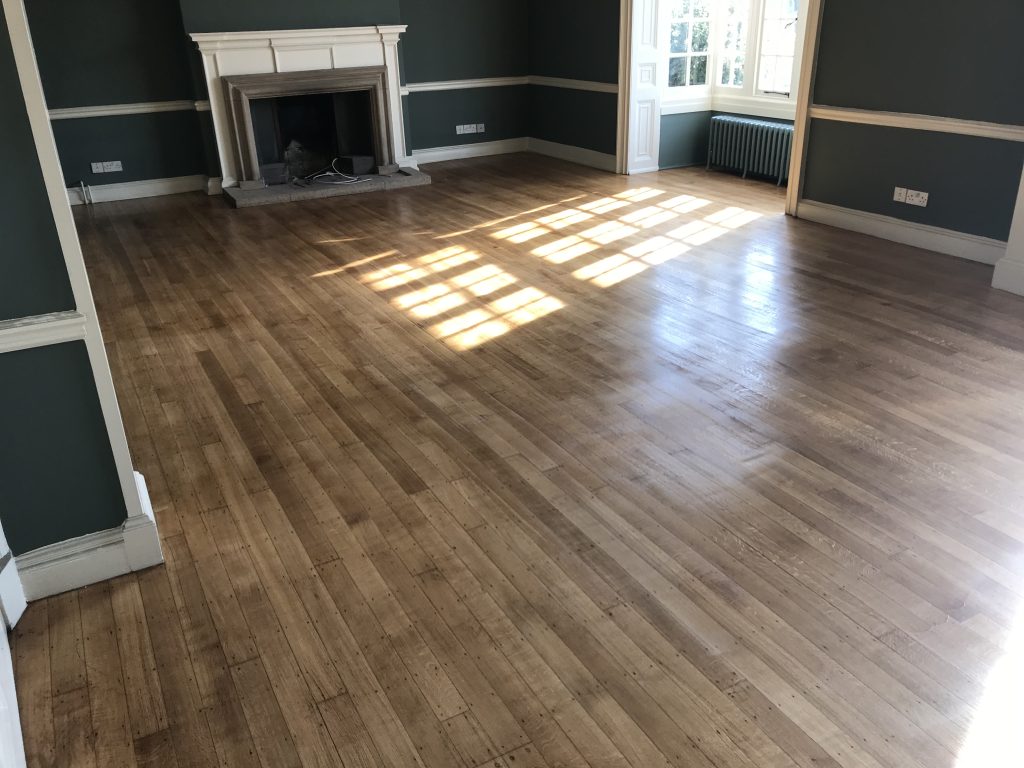 Hard Floor Restoration | wood floor restoration in living room