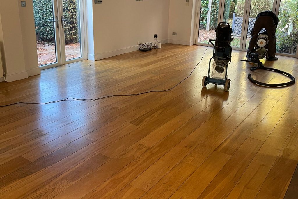 Dust-Free Floor Sanding | refinished wooden floor in home