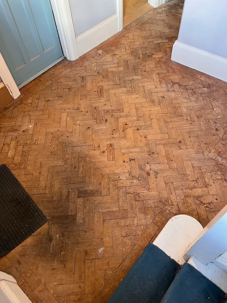how to restore dull wood floors in a domestic hallway